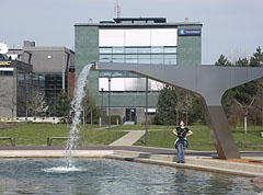 Modern style artificial waterfall at the small pond surrounded by office buildings - Budapest, Ungheria