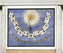 A blue painted sun-dial on the wall of the St. Nicholas's Cathedral - Любляна, Словения