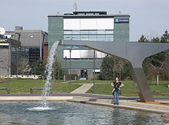 Modern style artificial waterfall at the small pond surrounded by office buildings - Будапешт, Угорщина