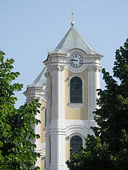 The towers of the St. Bartholomew's Church, from here seems to be in the linden trees of the main square - Gyöngyös, Maďarsko