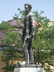 Statue of Sándor Petőfi (born as Sándor Petrovics, 1823-1849) Hungarian poet and revolutionist in front of the Evangelical Lutheran Church - Gödöllő, Ungaria