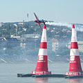 The German pilot Matthias Dolderer's high-performance aerobatic plane between the air pylons over the Danube River, in the Red Bull Air Race 2009, Budapest - Budapeste, Hungria