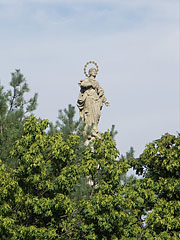 Statue of Our Lady Immaculate (Maria Immaculata) on the top of a 17-meter-tall obelisk in the main square - Tata, Hungria