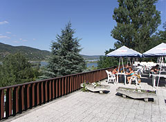 One of the terraces of the thermal bath at Lepence Valley, with a faded sunshade - Visegrád, Hungria