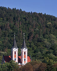 Towers of the Basilica and Pilgrimage Church of Virgin Mary at the foot of the verdant Tenkes Mountain - Máriagyűd, Мађарска