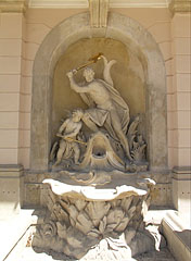 "Hercules (Heracles) is fighting with a giant fish" rococo water spouting sculpture group in a wall niche of the palace - Fertőd, Maďarsko