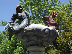 "The Good and the Bad" public work of art, ceramic angel and devil on the top of a column - Kiskunfélegyháza, Macaristan