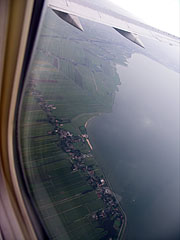 Above Amsterdam and below the clouds, in misty weather (view from the window of the airliner) - Amsterdam, Paesi Bassi