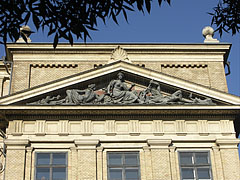 The pediment of the main building of the Eötvös Loránd University (ELTE) Faculty of Humanities (BTK) with a triangular tympanum, including the "Mineralogy" sculpture group - Budapest, Unkari