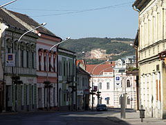 The view of the main street with shops and residental houses - Siklós, Węgry