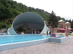 The outdoor shell pool with its characteristic cylindrical roof that was built in the 1960s - Miskolc, Hongarije