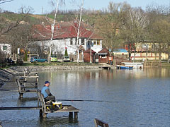 Fishing stands, and the entrance of the beach (ahead) - Bánk, Ungari