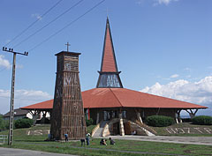 The St. Joseph the Worker Roman Catholic Church and its wooden belfry at the edge of the town - Szerencs, Ungari