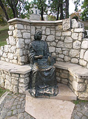 Seated bronze statue of Archbishop János Vitéz (1465-1472) on the side of the Castle Hill - Esztergom (Ostřihom), Maďarsko