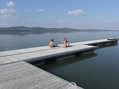 Autumn calm on the bathing platform in the Velence Lake, there's no wind just warm sunshine - Agárd, Maďarsko