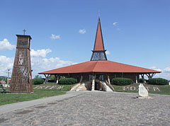 The contemporary Roman Catholic Church of St. Joseph the Worker, on its left it is the separate wooden belfry of it - Szerencs, Ungaria