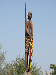 Wooden column with an indigenous African people statue on the top of it - Budapest, Ungheria