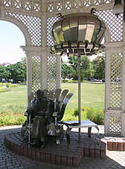 Bronze and chrome steel statue of Imre Kálmán celebrated Hungarian composer (1882-1953) in the pavilion - Siófok, Унгария