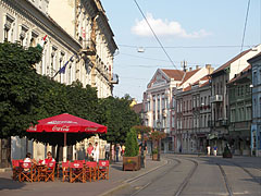 Restaurant terrace and tram rails on the main street of Miskolc - Miskolc (Мишкольц), Венгрия