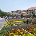 Flowers, fountain and colored houses in the renewed main square - Szombathely, Угорщина