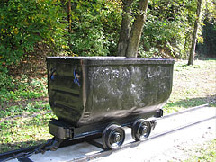 A minecart (also known as mining wagon, mine car, tippler, chaldron wagon or quarry tub) in the mining exhibition near the old smelter of Újmassa - Ómassa, Ungarn